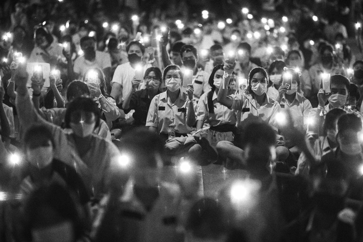 Young protestors Bangkok Bangkok 2020. High school students gathered in front of the Ministry of Education to protest against the dictatorship regime of Thai government. Photo: kan Sangtong / Shutterstock.com